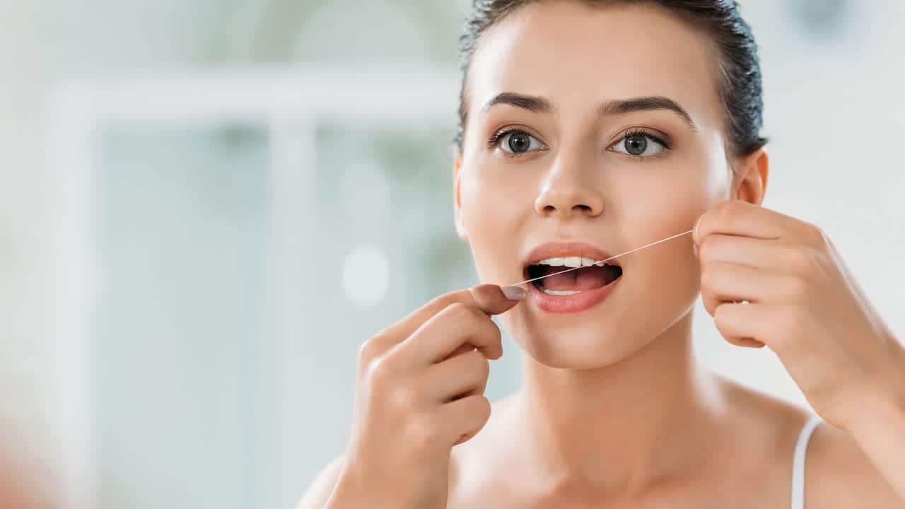 The Link Between Poor Flossing and Gum Disease Romford